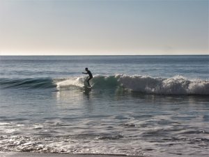 Our friend finding his flow on the mini malibu at Porto de Mos