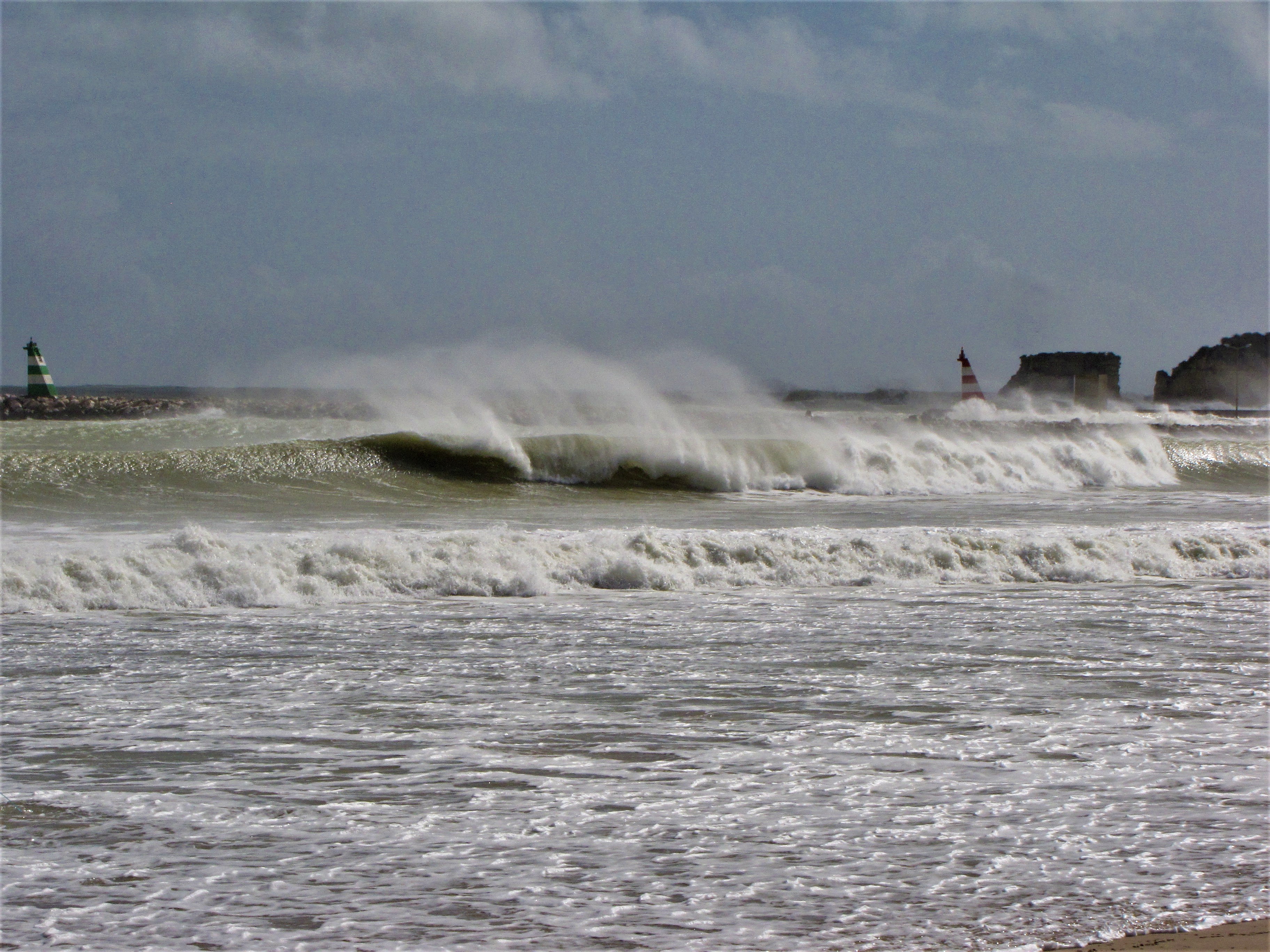 meia praia surfer almost in barrel
