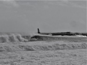 Unknown surfer get the wave of his life at barreling Meia Praia