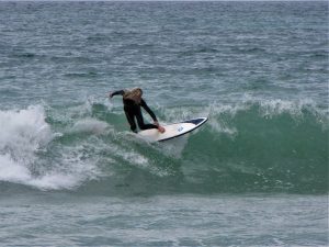 softech surfboard softtop at the sea in Lagos Algarve Portugal