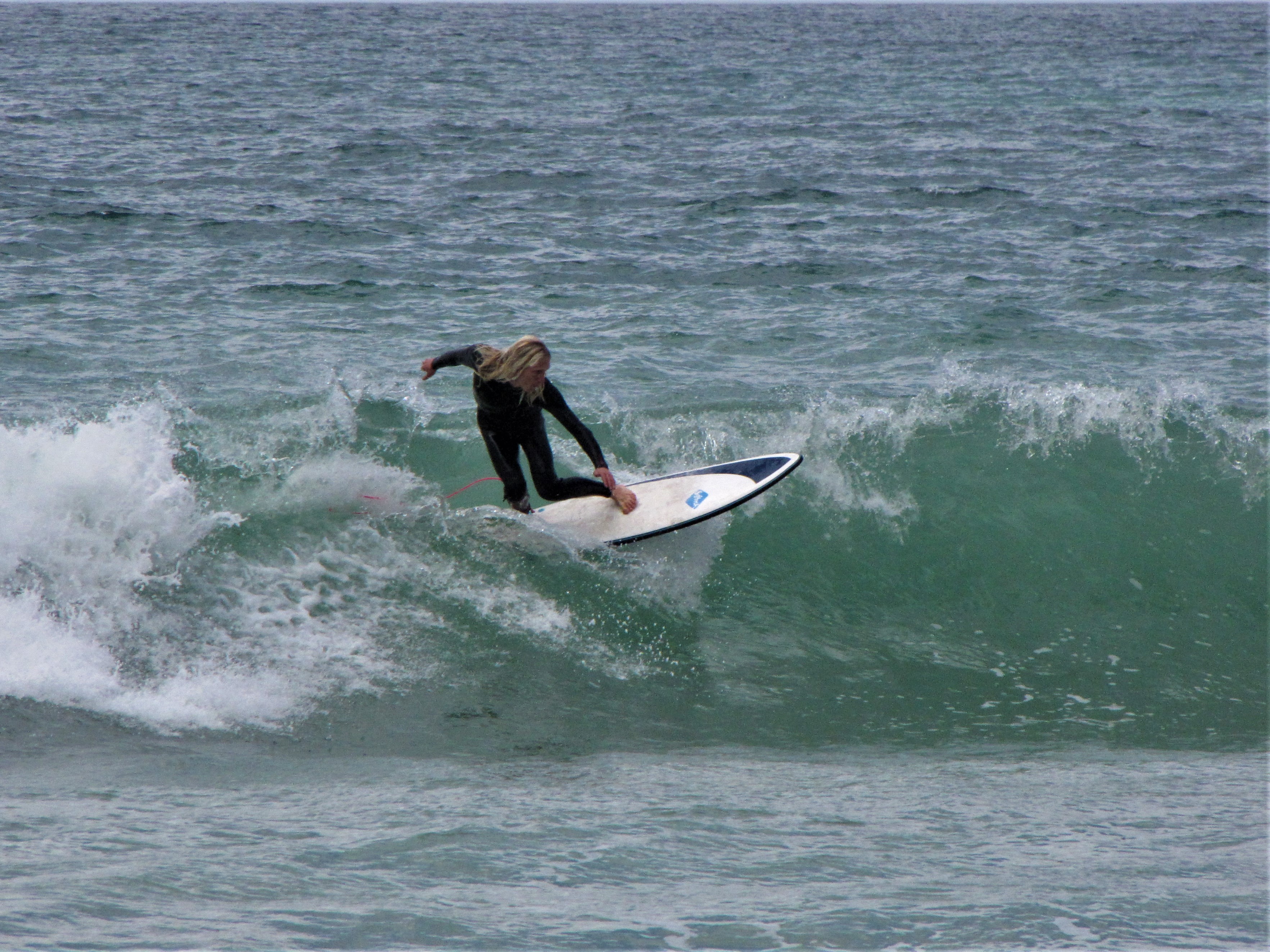 softech surfboard softtop at the sea in Lagos Algarve Portugal