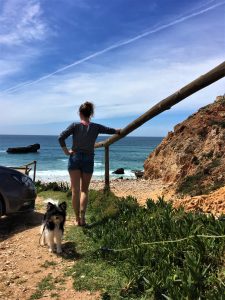 surfer girl legs and surfdog