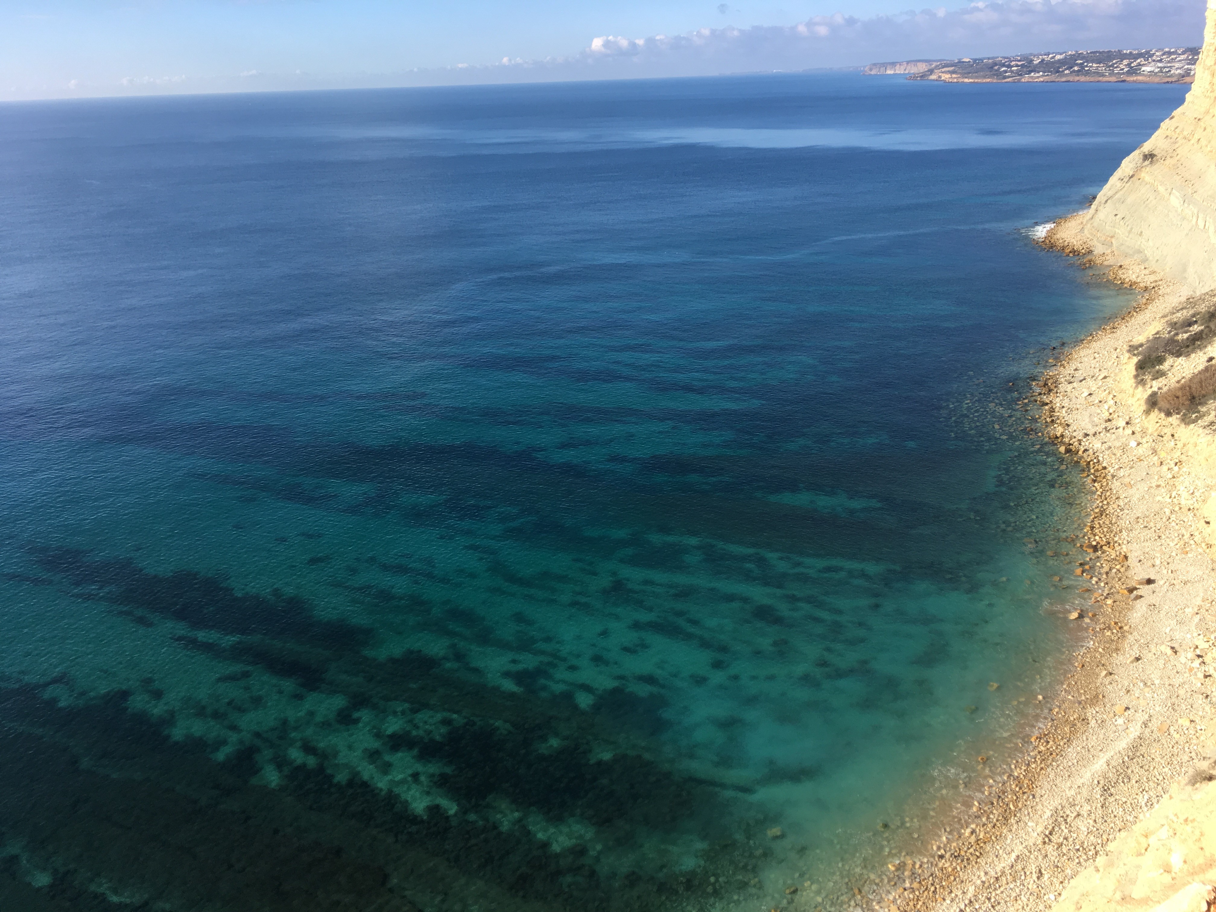 Porto de Mos has a beautiful flat stone reef, perfect set up for some good surf!