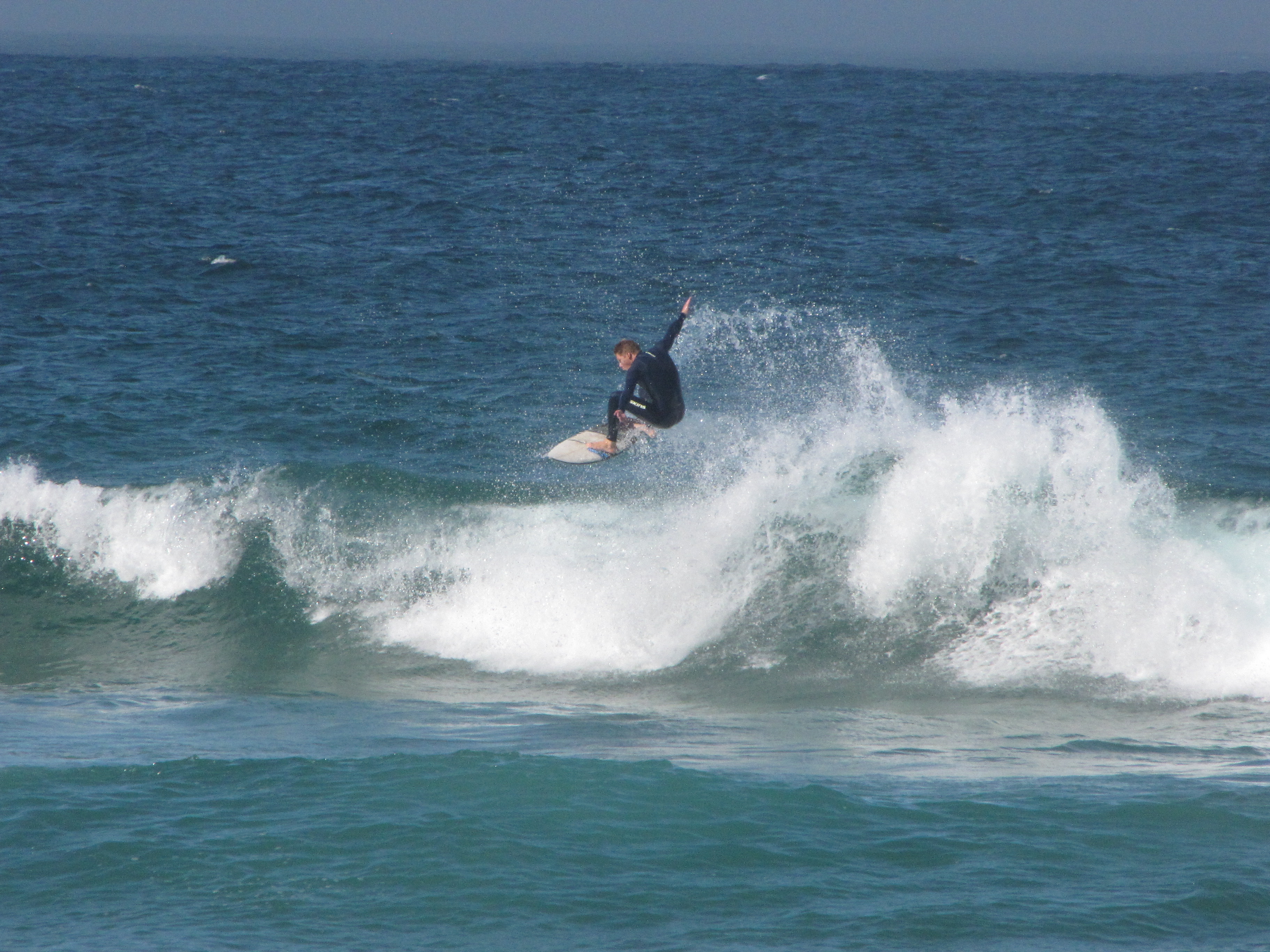 Unknown rider blasting a straight air of a nice wave at cordoama