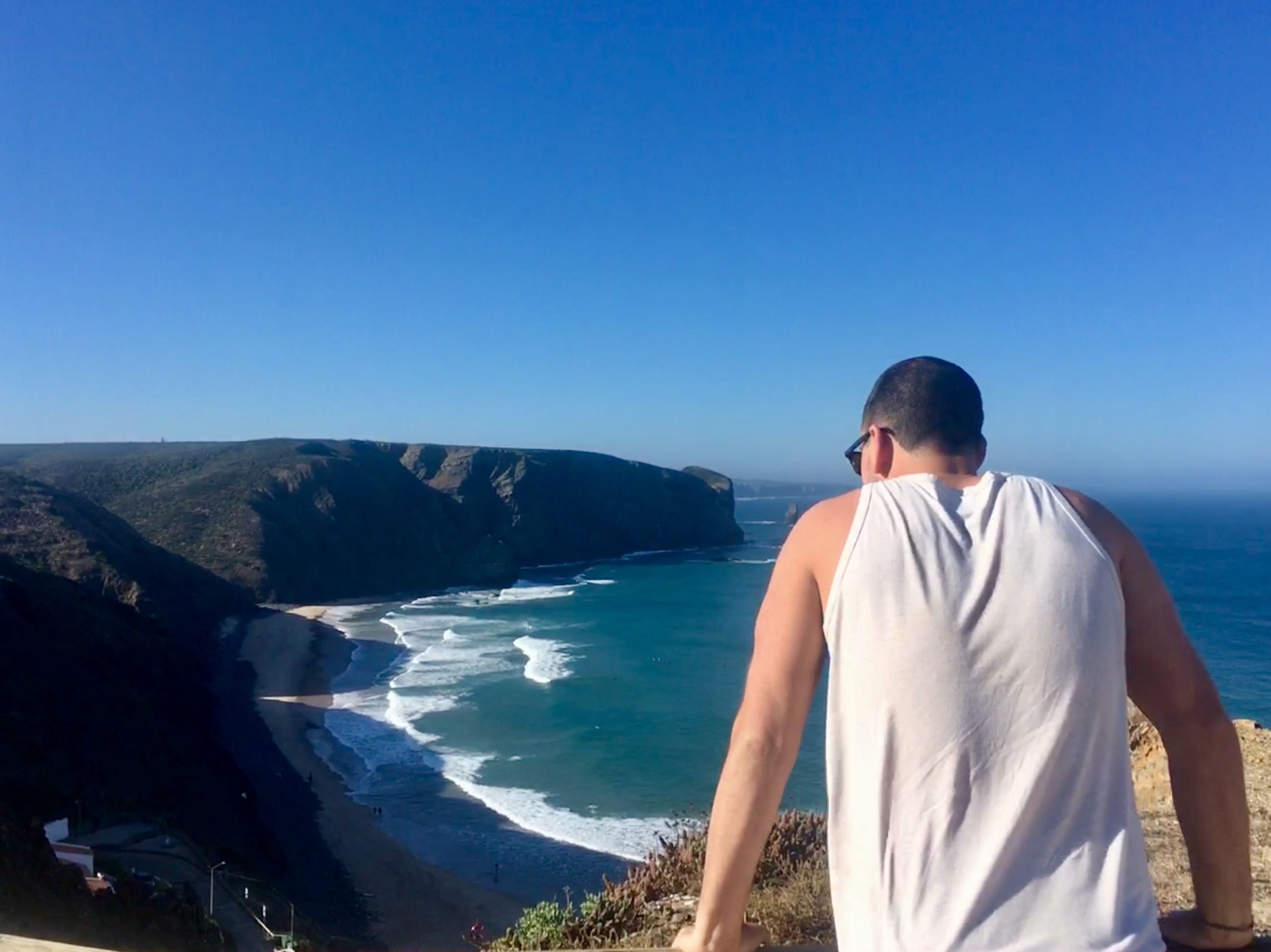 my american friend totally blown away by the view of the surf at arrifana