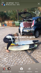 girl waxing surfboard zavial