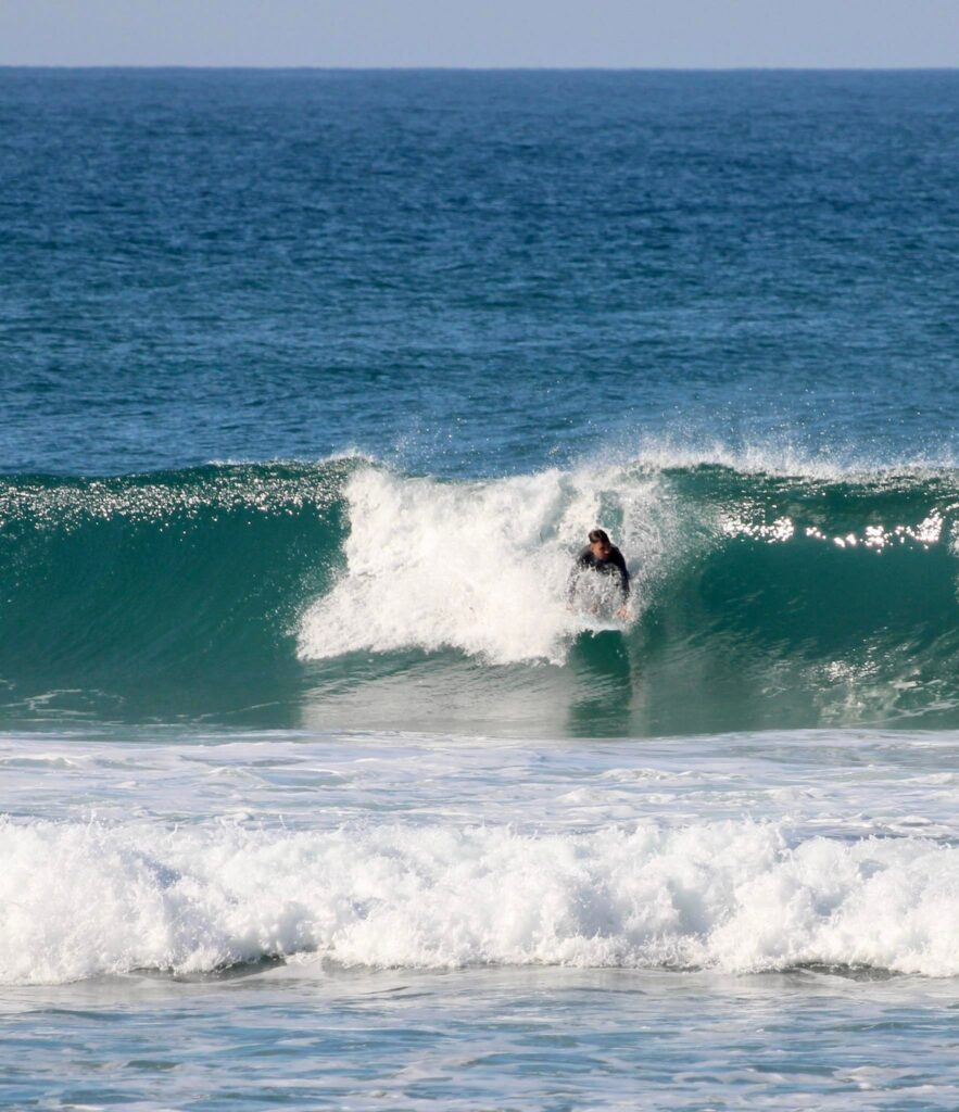 barrel-backside-surfing-portugal-with-surfguide-algarve