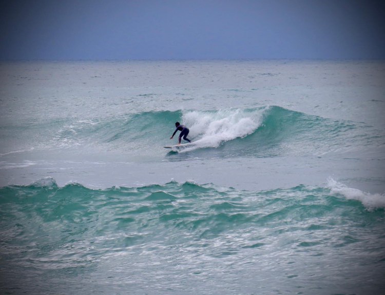 Luz surf in the rain with surf guide algarve