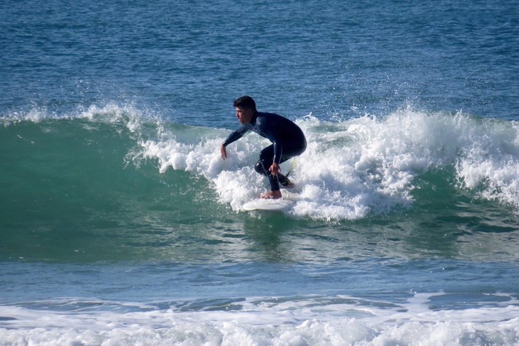 compressed surfer after surfskate training surf guide algarve