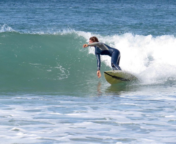 Bottom turn surf girl surf guide algarve