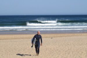 stoked surfer castelejo with surf guide algarve