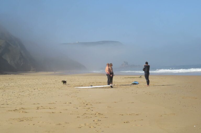 surf guide algarve on cordoama beach alone