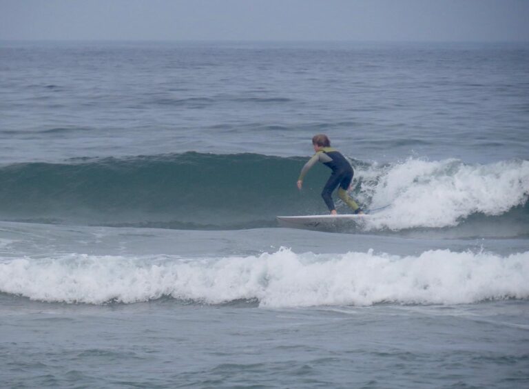 Perfect small wave surfing with Surf Guide Algarve