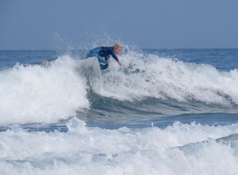 Small surfer, big turn with surf guide algarve