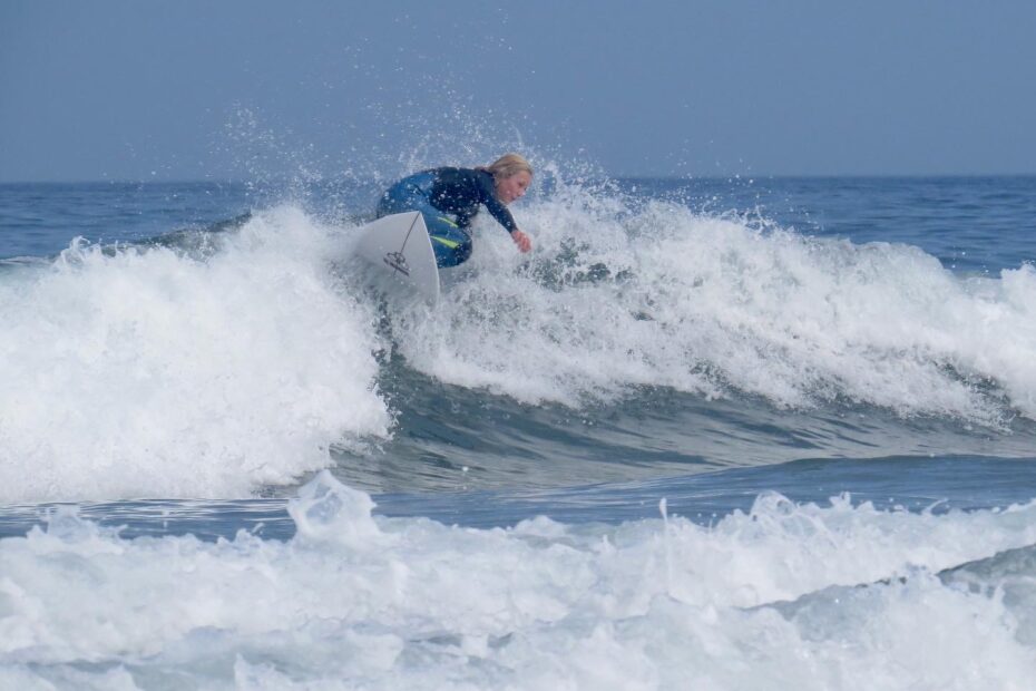 Small surfer, big turn with surf guide algarve