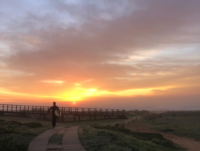 Sunrise surfing Lagos Meia Praia Surf Guide Algarve