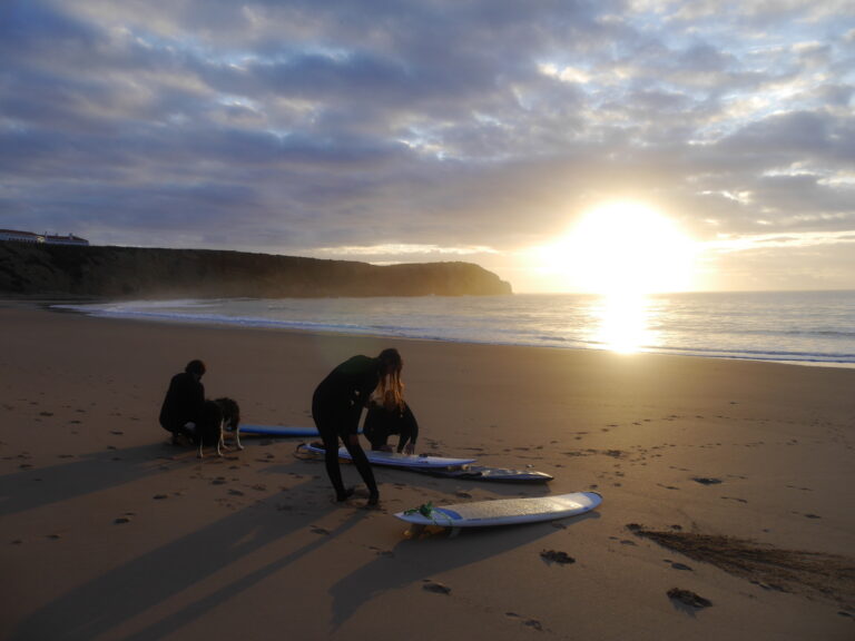 Sunrise surfing Sagres with surf guide algarve