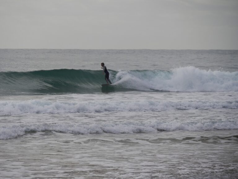 Surfing Clean waves in Sagres with surf guide algarve