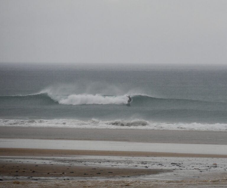 cordoama surfing in the rain surf guide algarve