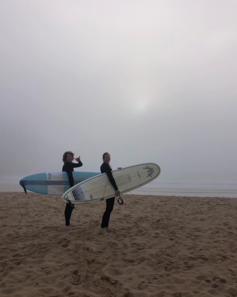 stoked surfers in the mist surf guide algarve