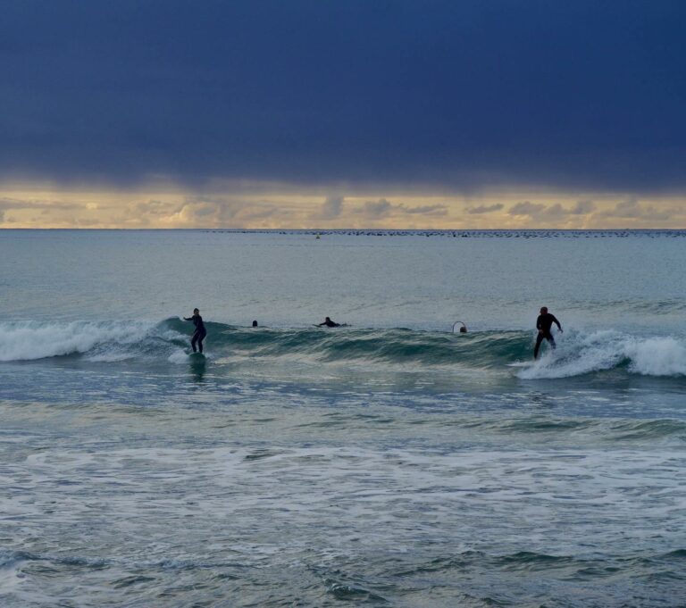 Surfing together one wave zavial with surf guide algarve