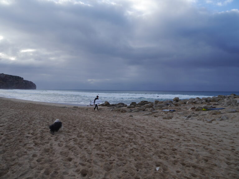 Zavial beach moody sky surf guide algarve