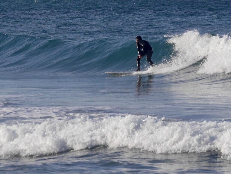 tonel surfing right with surf guide algarve