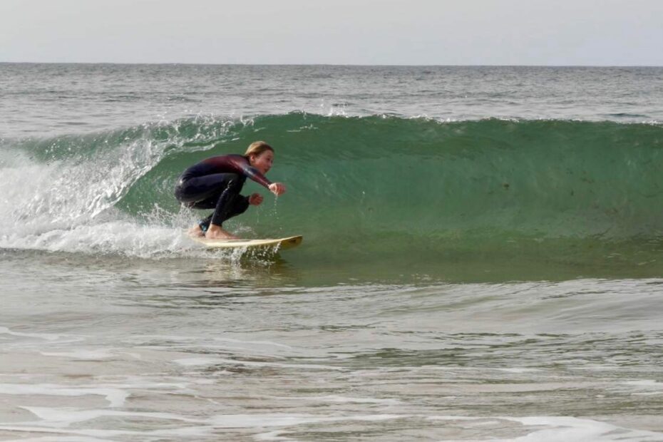 kid surfing surf guide algarve