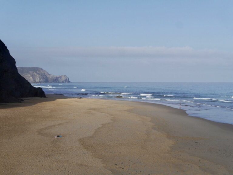 empty beach cordoama surf guide algarve