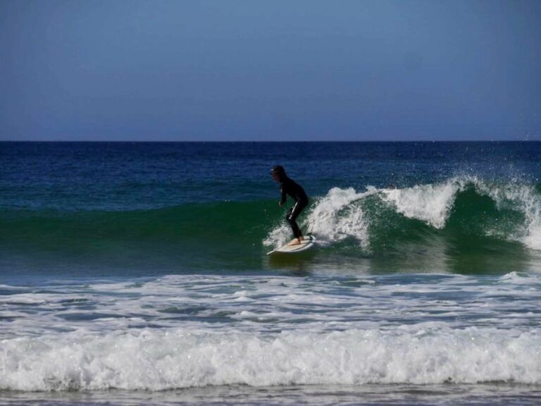 longboard on a 6,8 super gromm surfing zavial surf guide algarve