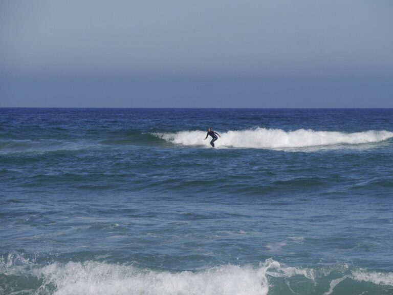 surfergirl surfing cordoama summer waves surf guide algarve