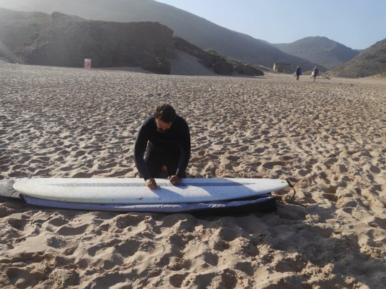 waxing down our surfboard, we cant wait for june, surf guide algarve cordoama