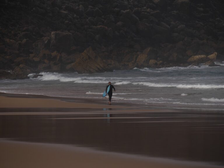 tonel proud surfer walk