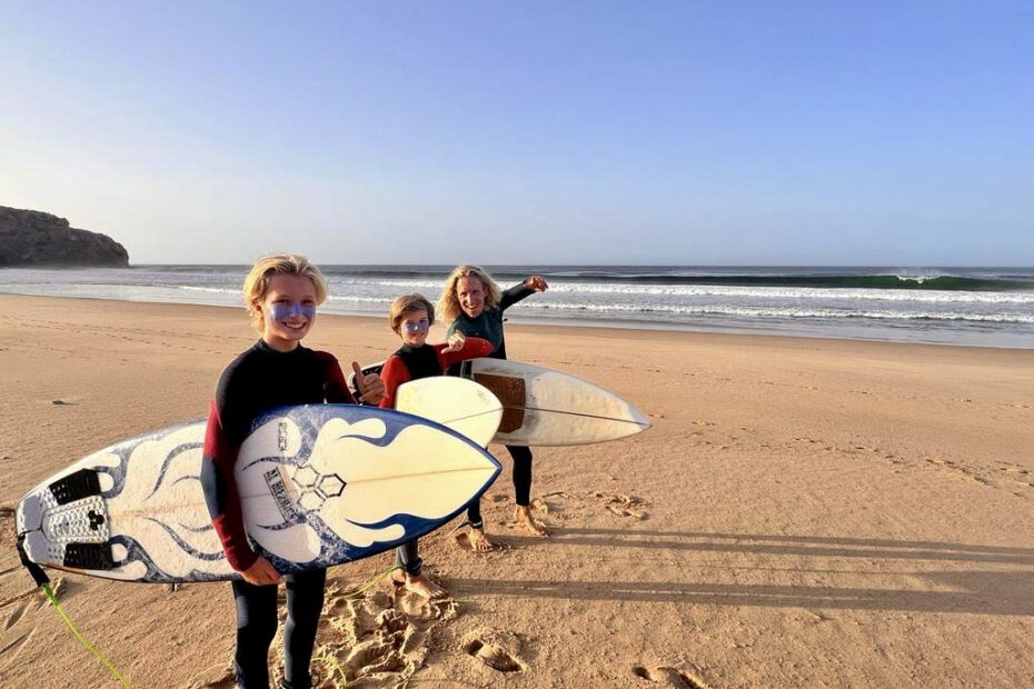 stoked gromms on the beach of zavial surf guide algarve