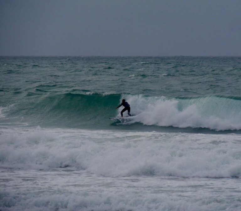 diamond in the rough storm surfing with surf guide algarve