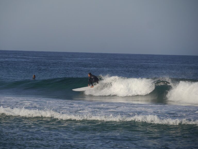 midlength surfing surf girl surf guide algarve