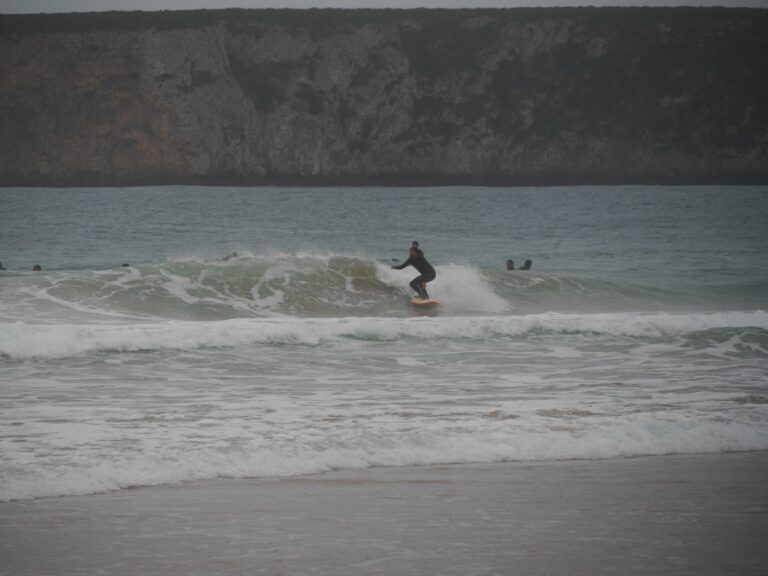surfing small wave in beliche surf guide algarve