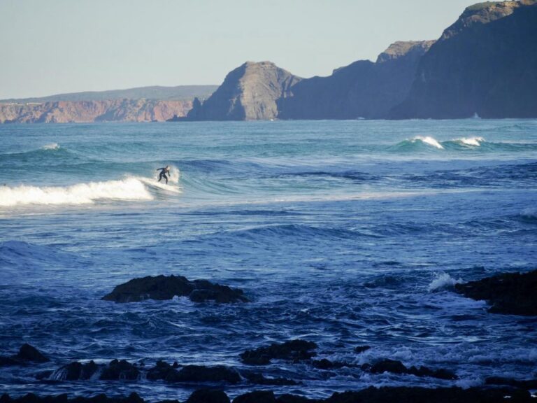 surf girl empty waves west coast surf guide algarve