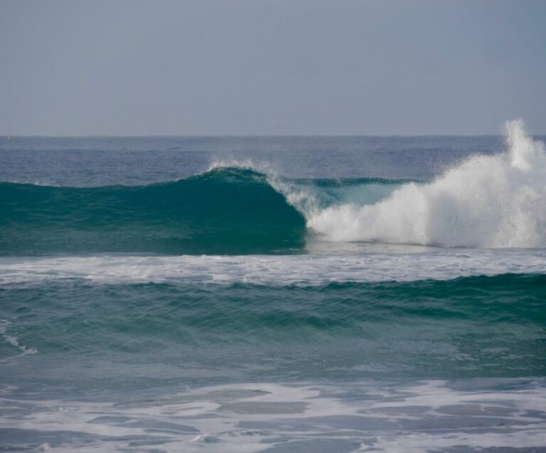 clean empty waves at zavial surf guide algarve