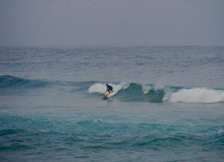 first wave on the new surfboard with surf guide algarve