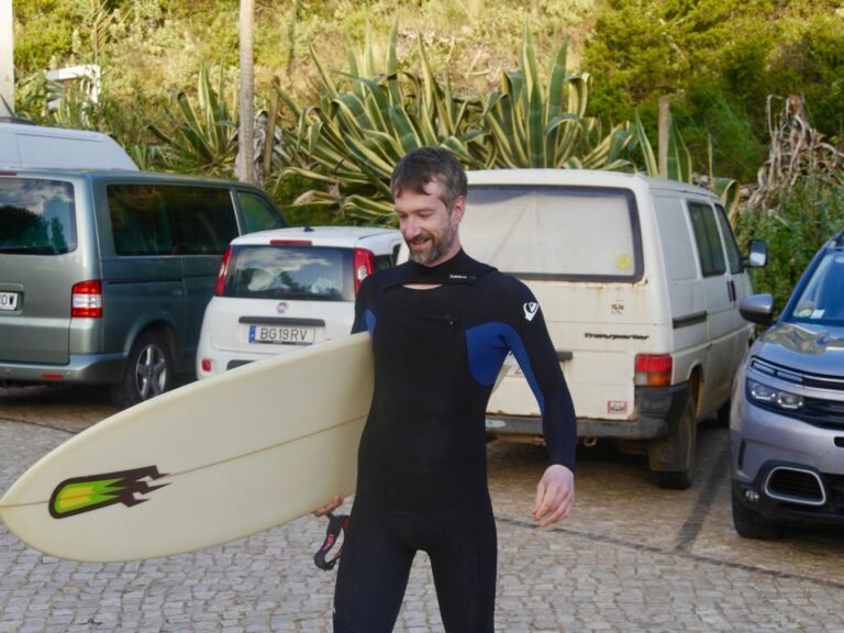 kana beach surfboard stoked french surfer with surf guide algarve