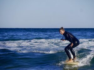 longboard surfing bordeira surf guide algarve sufergirl
