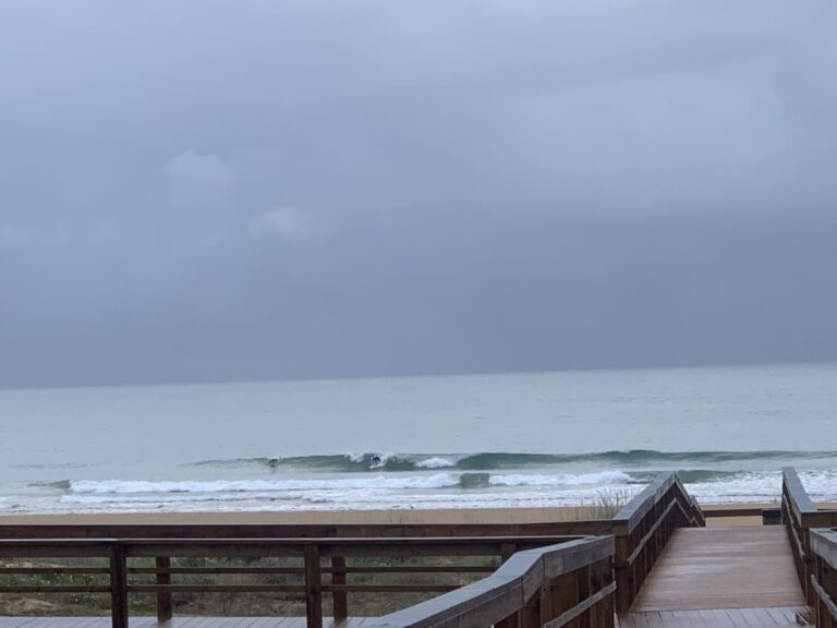 surfing in the storm surf guide algarve in lagos