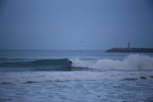 first wave of the day at supertubos with surf guide algarve