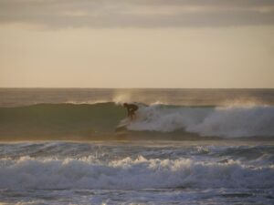golden waves in Porto de Mos Lagos with surf guide algarve,