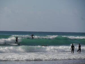 left or right? surfing friendly waves in burgau with surf guide algarve